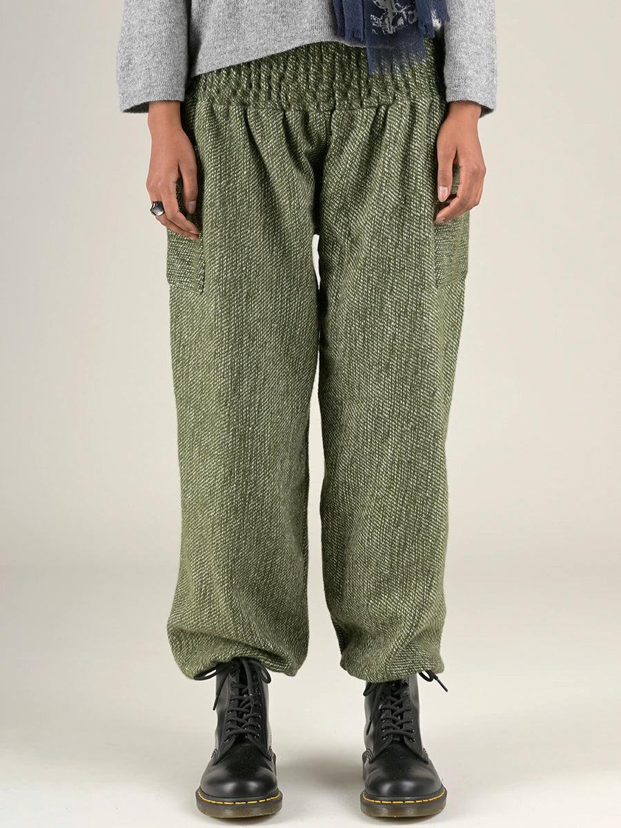 Pantalon bouffant pure laine à texture verte mousse