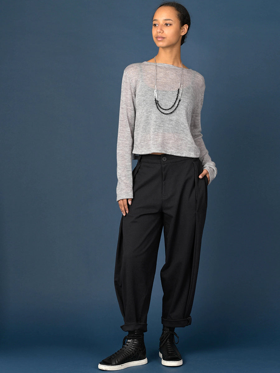 Relaxed-fit trousers with side pleats