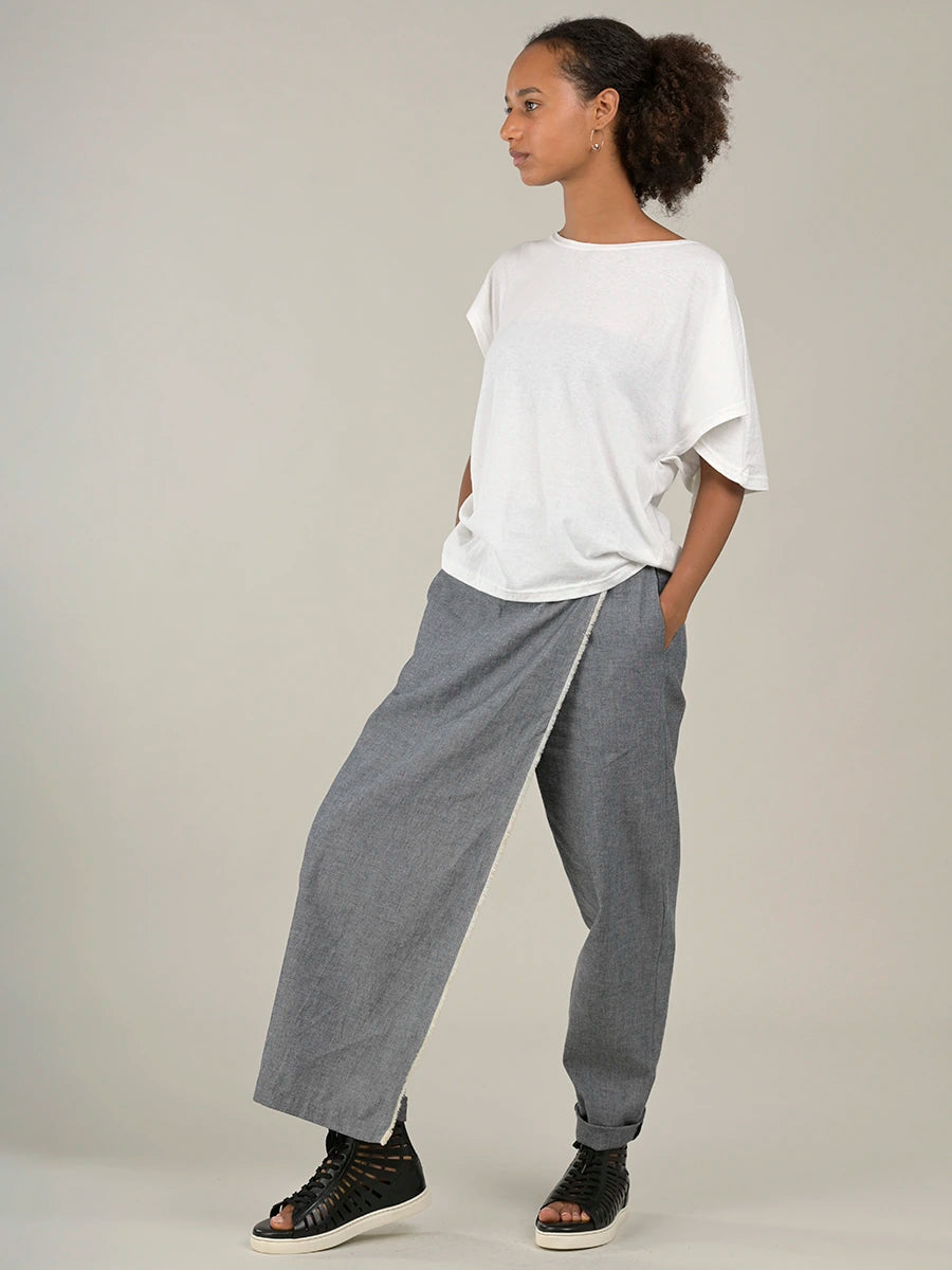 Wrap front trousers with fringes